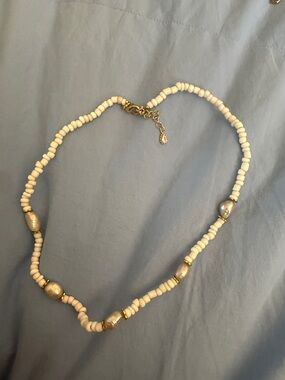 Handcrafted White Beaded Necklace with Gold Accents